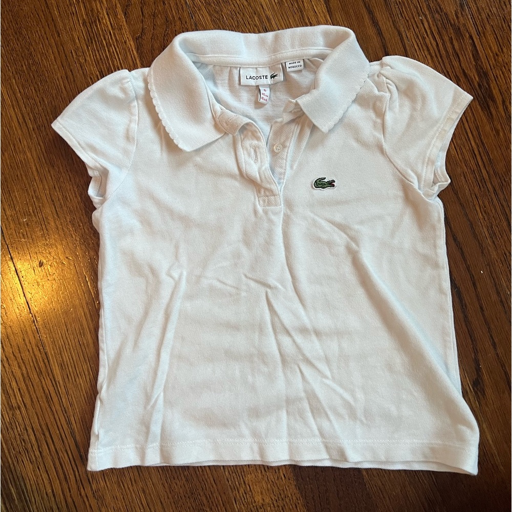 Lacoste polo for girl- white-size 6 (but I feel like it fits 4/5)